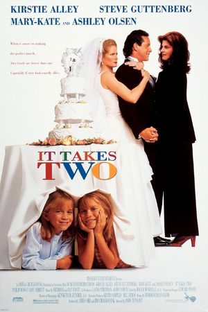 Two young girls hide under a table holding a wedding cake, while a man is sandwiched between two women, one wearing a wedding gown.
